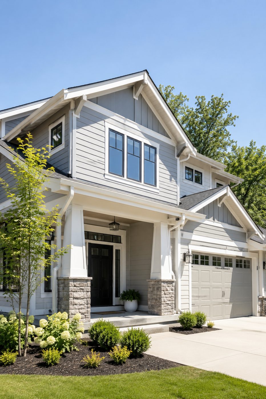 Freshly painted craftsman home exterior with gray siding and white trim — Renton